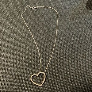 Silver heart shaped pendant necklace